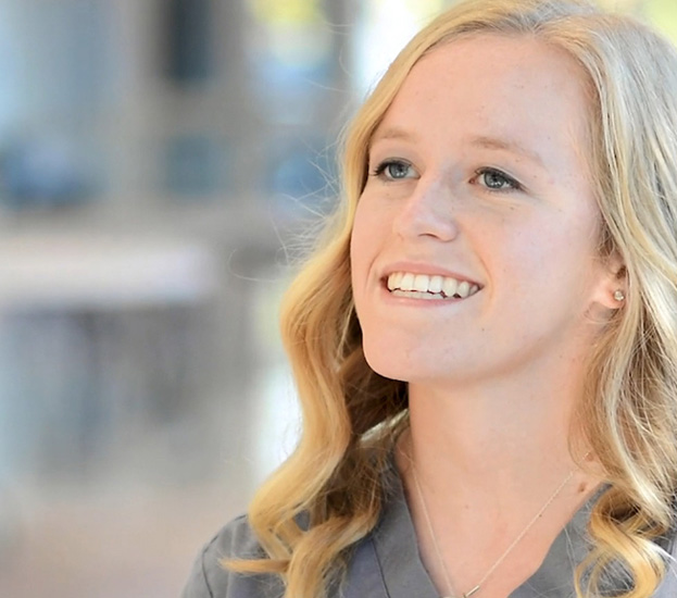Two young female nurse smiling.